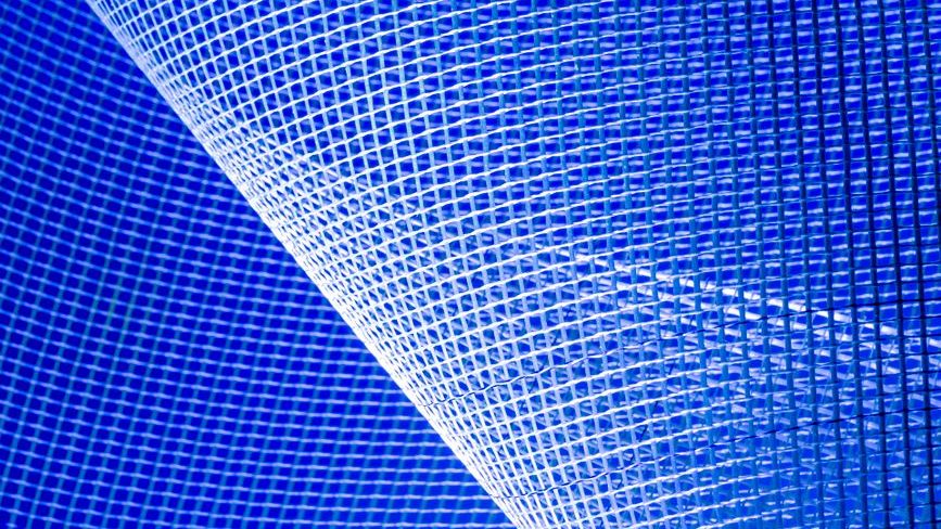 Abstract blue network mesh representing digital connectivity